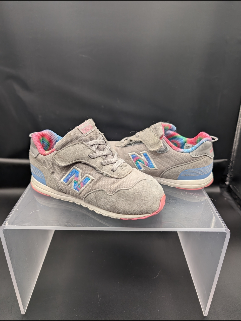 New Balance Kids Gray Sneakers with Blue Logos and Pink Trim